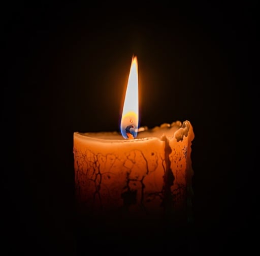 Memorial candle glowing for funeral homes in Mount Holly, NJ.